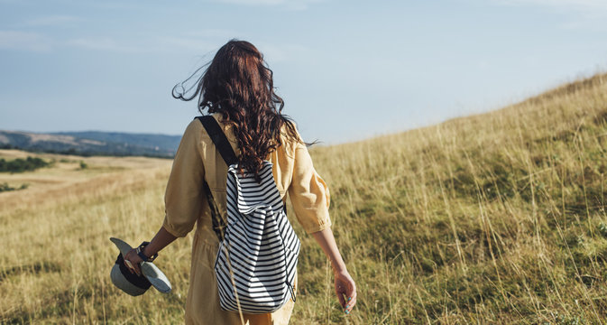 Woman With a Backpack Hiking 