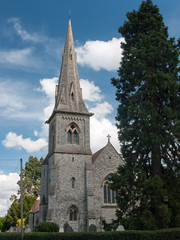Fototapeta na wymiar lovely grey brick church outside in england in the country misley england uk