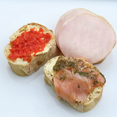 White bread stuffed with butter and smoked salmon isolated healthy food