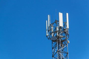 Technology on the top of the telecommunication GSM. Masts for mobile phone signal. Tower with...