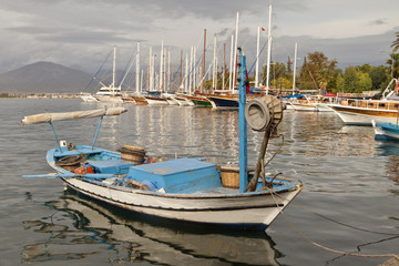 Fototapeta premium Unnamed boats in the ancient harbor of Fethiye, (Hisaronu, Turkey)Turkey, in Lycia on the coast of Mediterranean