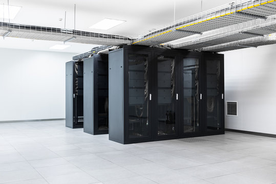 Servers in storage cabinets in data center