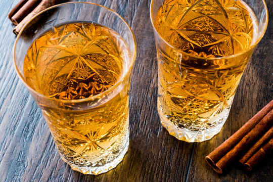 Safran or Koruk serbeti / Saffron Sherbet with cinnamon sticks.