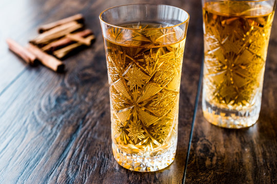 Safran or Koruk serbeti / Saffron Sherbet with cinnamon sticks.