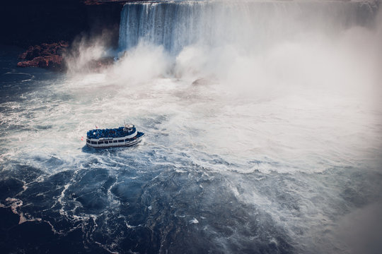 boat with tourists in Niagara Falls