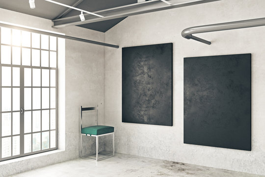 Concrete room with two chalkboards