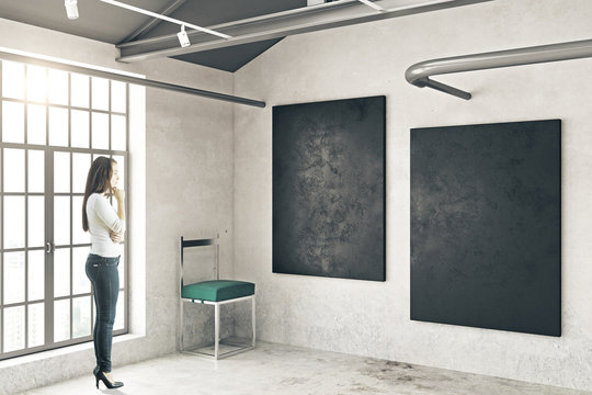 Woman in room with chalkboards