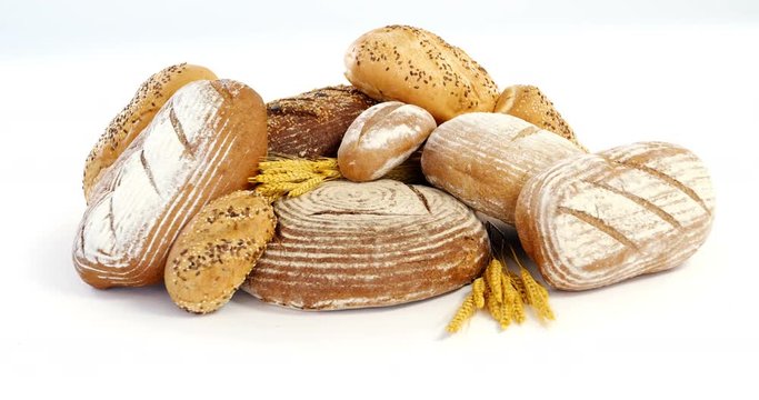 Various types of breads with wheat grains