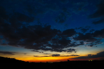 Dark sky with clouds after sunset.