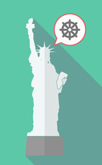 Long shadow statue of libety with a dharma chakra sign