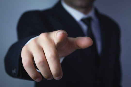 Businessman Pointing Finger At You.