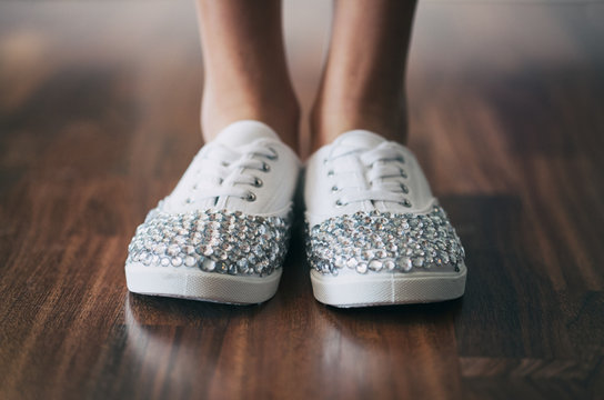 Girl Wearing Sparkly Shoes With Rhinestones