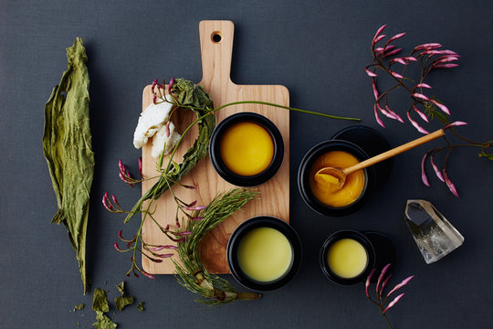 Various organic beauty products with ingredients 