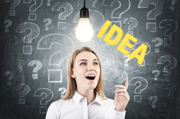 Surprised blond woman and a business idea