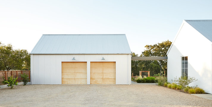 Architecture image of modern design farmhouse and garage 