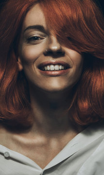 Conceptual  portrait of hip young ginger female