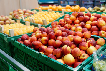 Peaches and apricots in a supermarket