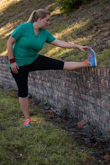 Woman performing stretching exercise