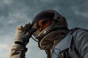 A heroic portrait of a young astronaut 