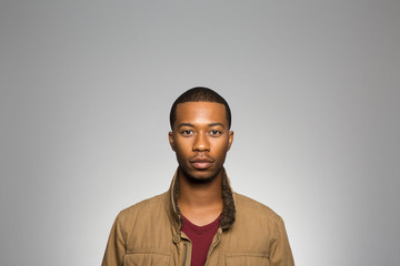 studio portrait of a confident young man 