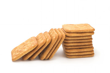 Fototapeta na wymiar Salted biscuits on white background