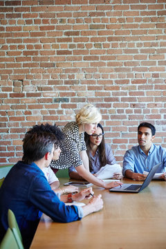 Group of millennials in meeting at start up business