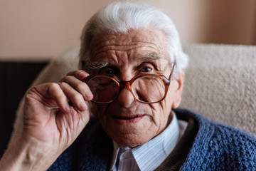 Senior man sitting at home