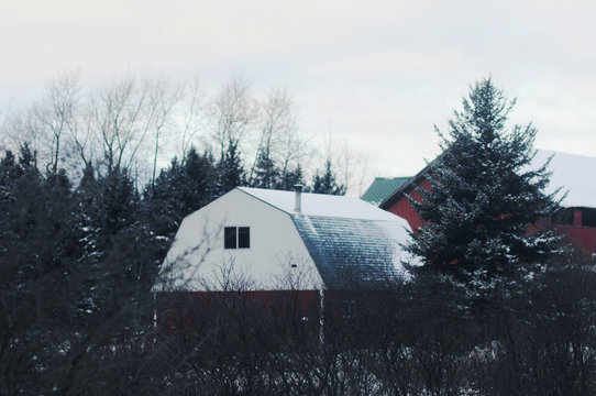 Barn covered in snow
