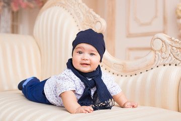 portrait of happy little baby boy smiling