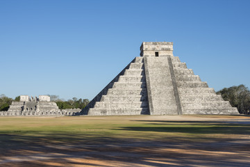 Chichen Itza el Castillo and Temple of the Warriors on sunny afternoon