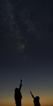 mother and child looking stars