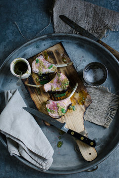 Minted lamb chops on a cutting board