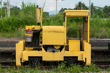 Old yellow train abandoned at Gemas railway station, Malaysia