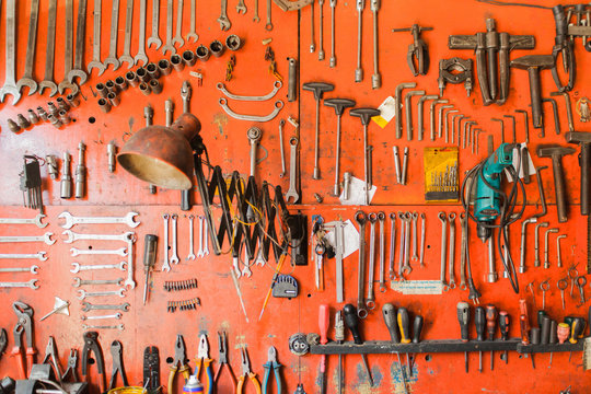 Mechanic set of  tool on rustic red backgorund