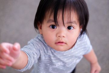 Cute asian baby girl. Portrait of Asian beautiful baby girl of 1 year and 3 months old.