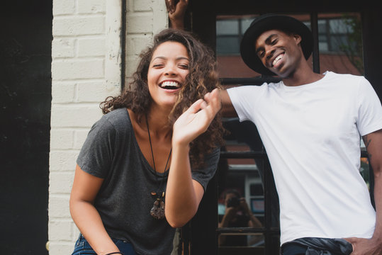 Young Woman And Man Laughing