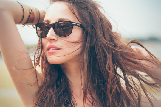 Portrait of a Woman With Sunglasses