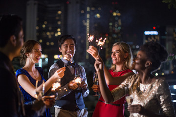 Group of friends celebrating New Year's eve