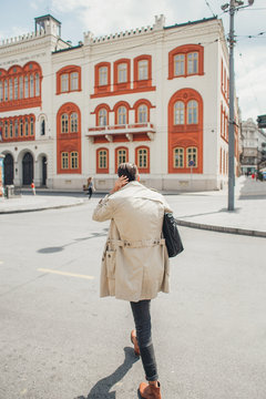 Young Business Man Walking in the Street