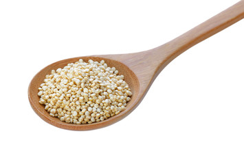 Quinoa in a wood spoon on white background