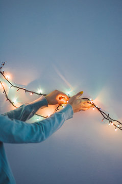 Girl prepare flashlights for New Year