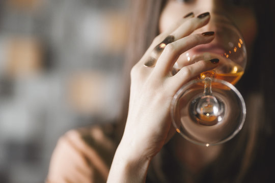 Woman Drinking White Wine