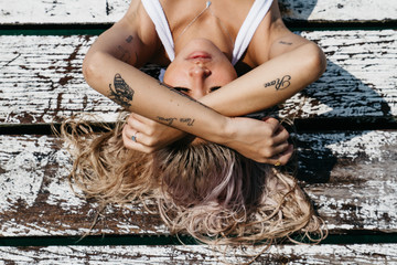 Young fashionable asian female model wears bikini swimsuit at beach