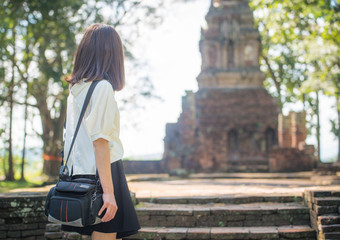Asian girl travel in Wat Pasak in Chiang Saen district of Chiang Rai province of Thailand.