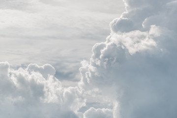 White sky and puffy cloud.