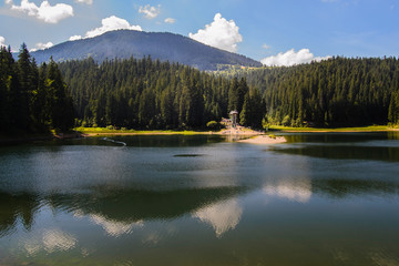 Mountainous lake with reflection