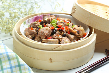 soy Steamed ribs in bamboo steamer © xb100