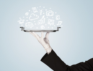 Waiter holding tray with media icons