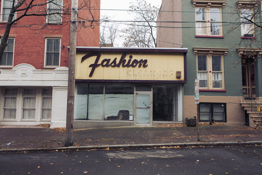 Exterior View Of Fashion Store Near Street