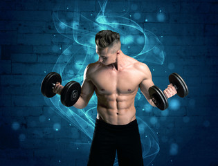 Attractive strong fitness guy lifting weight